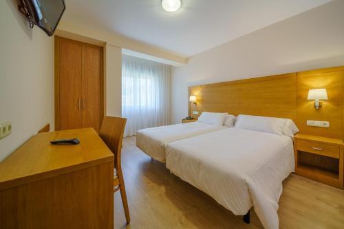 Foto de una habitación de Hotel El Puente