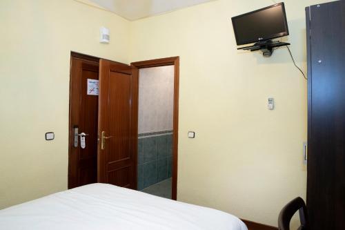 Foto de una habitación de Hostal Tokio