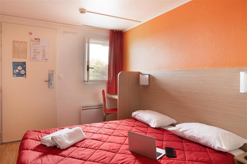 Foto de una habitación de Hotel Première Classe La Ville-Du-Bois