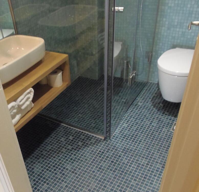 Foto del baño de Yakinthos Hotel