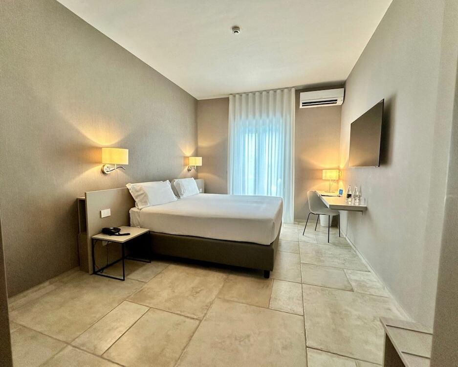 Foto de una habitación de Hotel Riva Del Sole