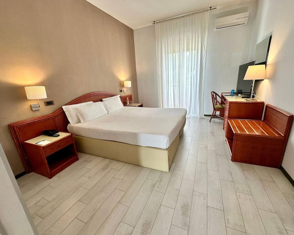 Foto de una habitación de Hotel Riva Del Sole
