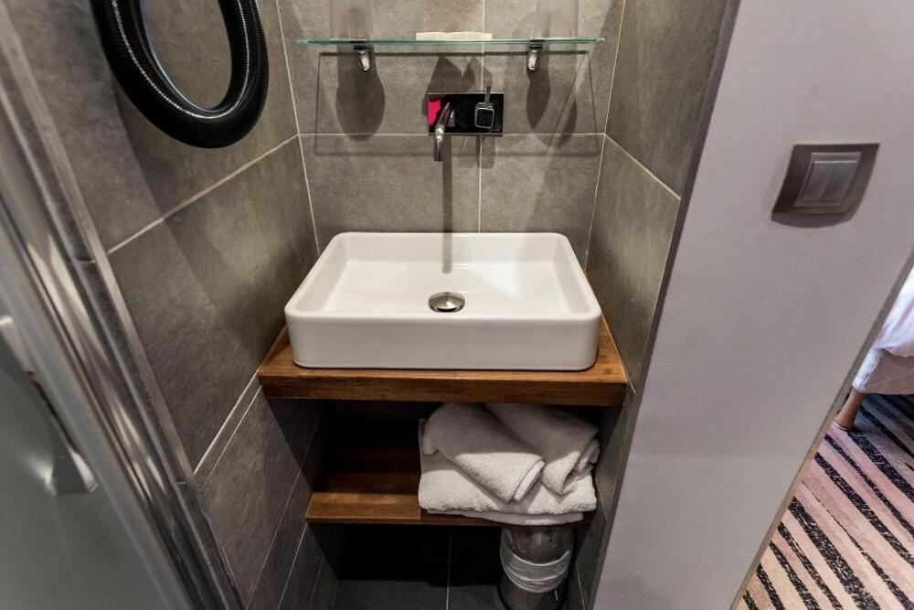 Foto del baño de Hotel Lumières Montmartre Paris