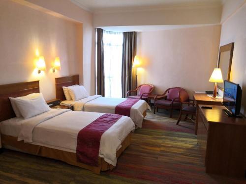 Foto de una habitación de Hotel Grand Continental Kuala Terengganu