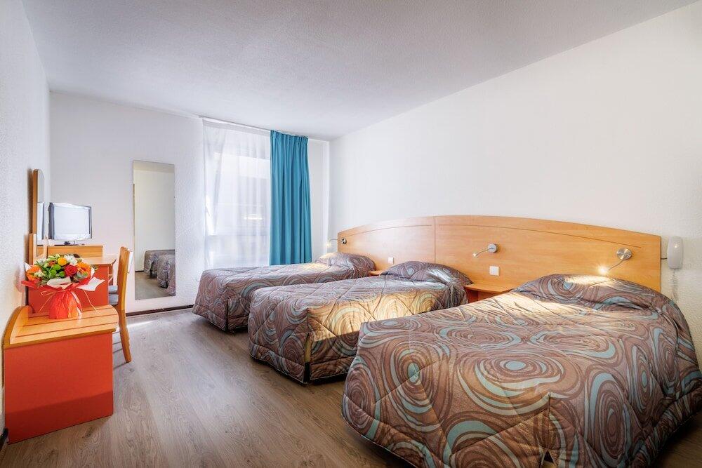 Foto de una habitación de Hôtel Ariane