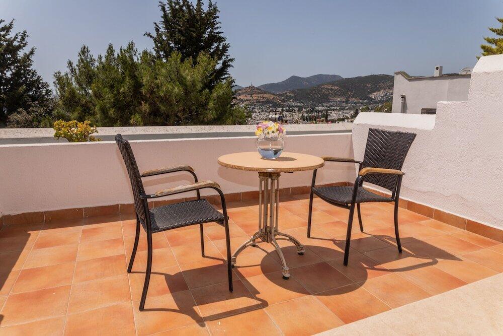 Foto de una habitación de Manastir Hotel &amp;amp; Suites