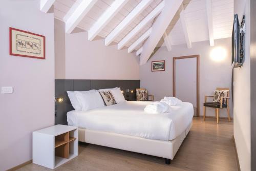Foto de una habitación de Hotel Osteria della Pista