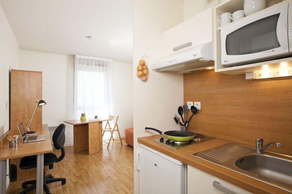 Foto de una habitación de Aparthotel Séjours &amp;amp; Affaires Rennes Longs Champs