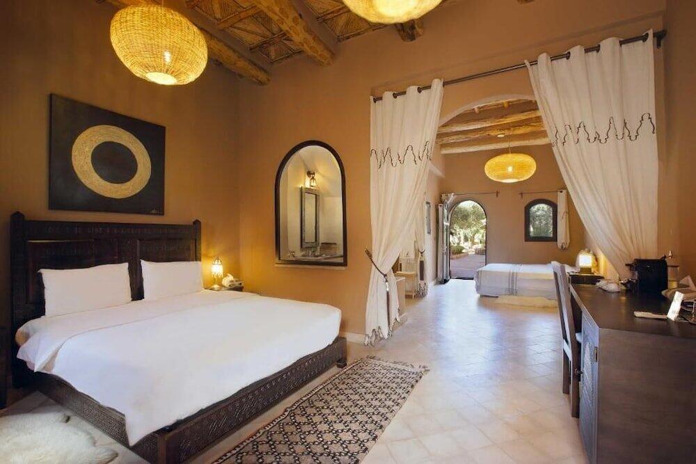Foto de una habitación de Riad Ksar Ighnda