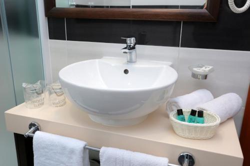 Foto del baño de Hotel As