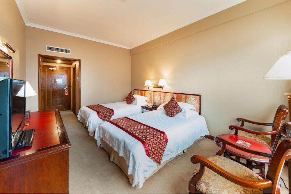 Foto de una habitación de Yanling Hotel