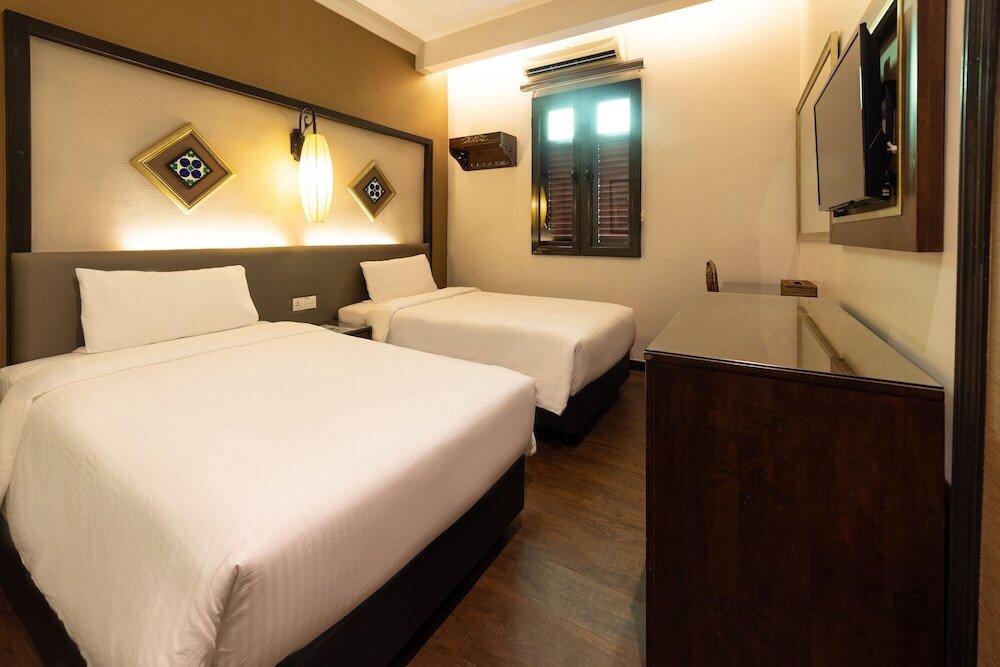 Foto de una habitación de Hotel Puri Melaka