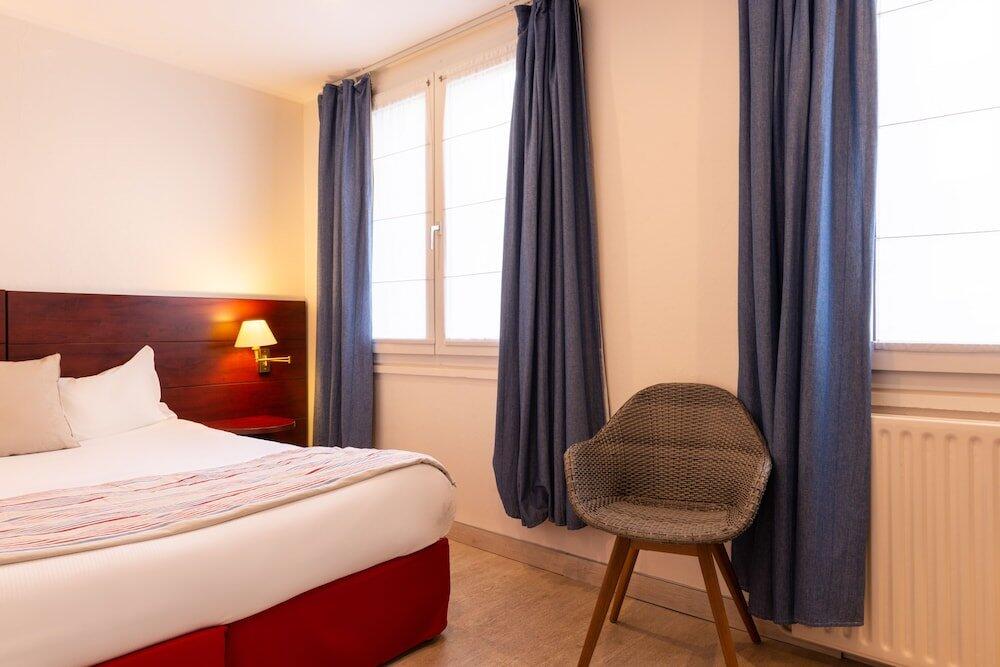 Foto de una habitación de Hôtel de la Plage