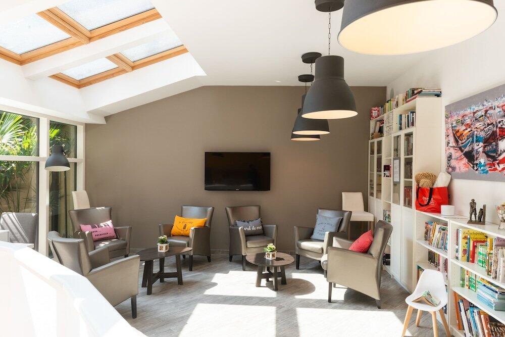 Foto de una habitación de Hôtel de la Plage