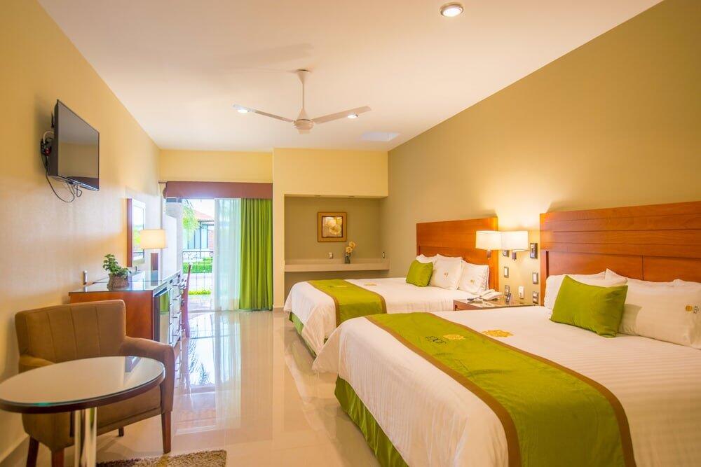 Foto de una habitación de Hotel Ecce Inn &amp;amp; Spa