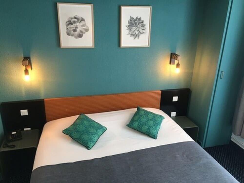 Foto de una habitación de Hotel Le Progres