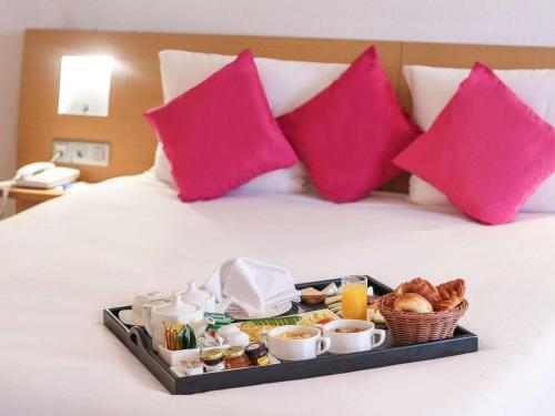 Foto de una habitación de Hotel Novotel Tunis