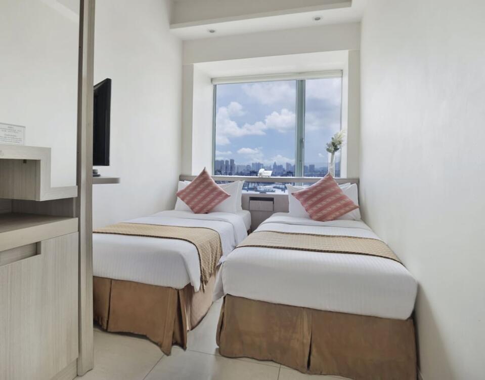 Foto de una habitación de Rambler Oasis Hotel