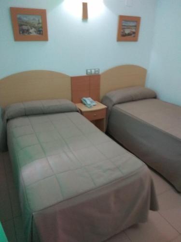 Foto de una habitación de Hostal El Arco