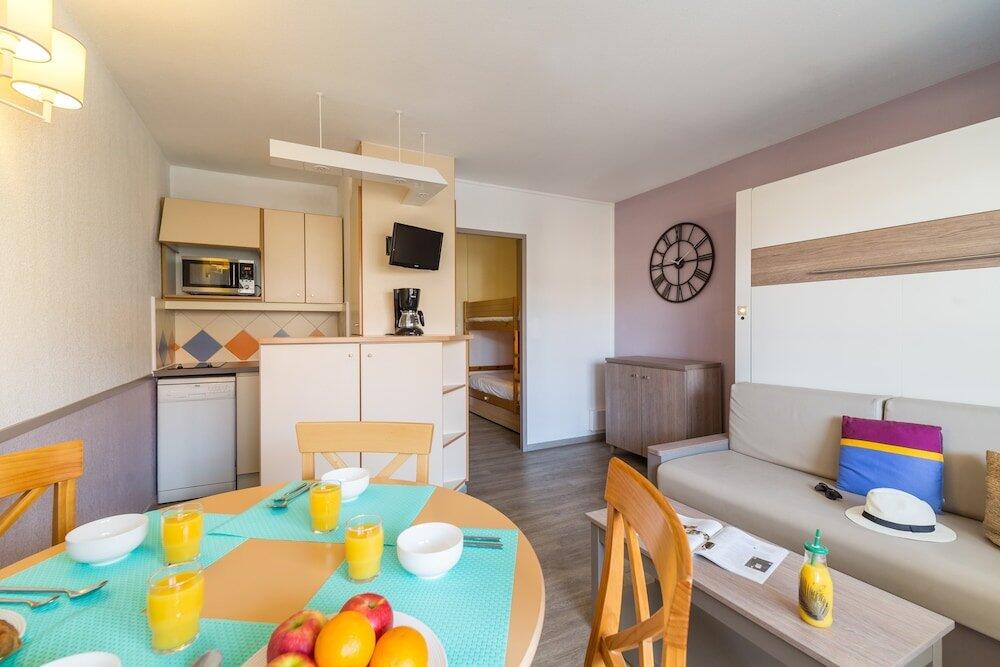 Foto de una habitación de Résidence Pierre &amp;amp; Vacances Les Platanes