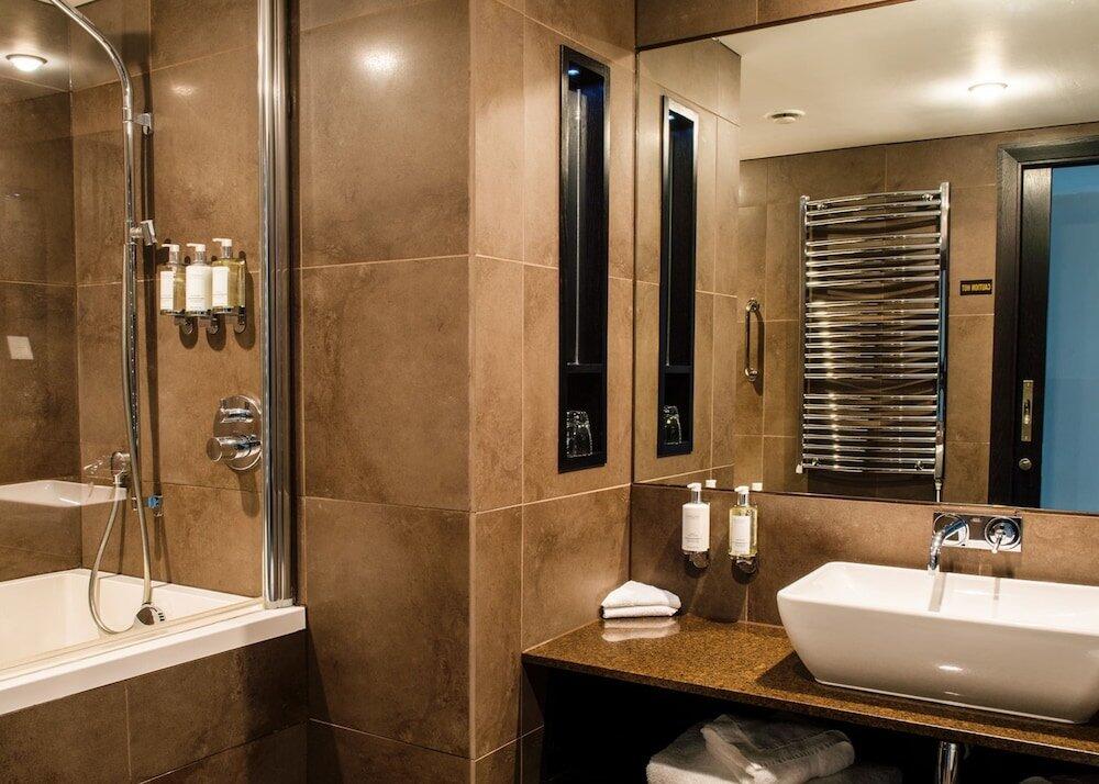 Foto del baño de The Vincent Hotel