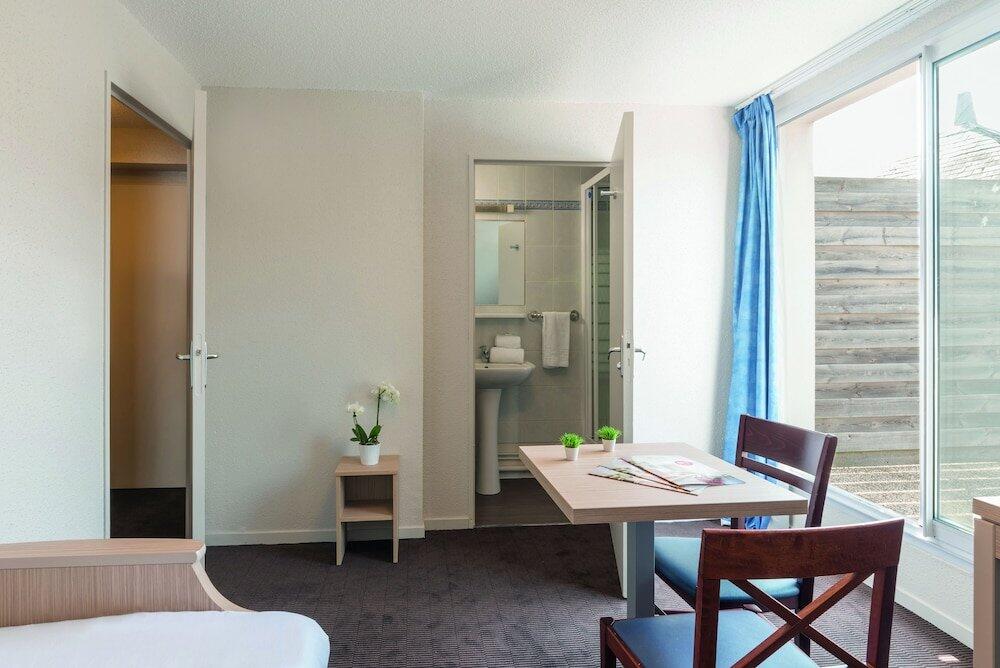 Foto de una habitación de Appart&amp;#039;City Classic Nantes Viarme