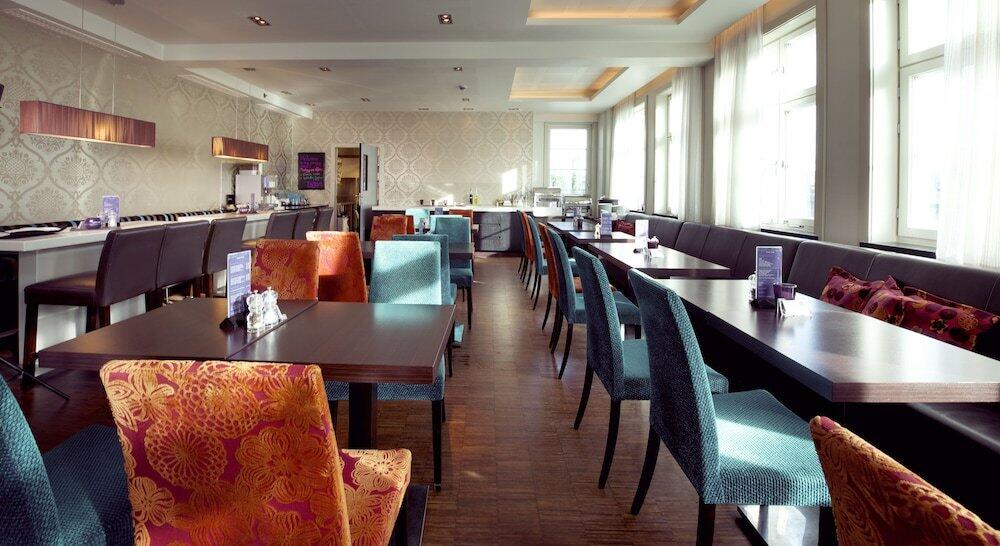 Foto de restauración de Clarion Collection Hotel Folketeateret