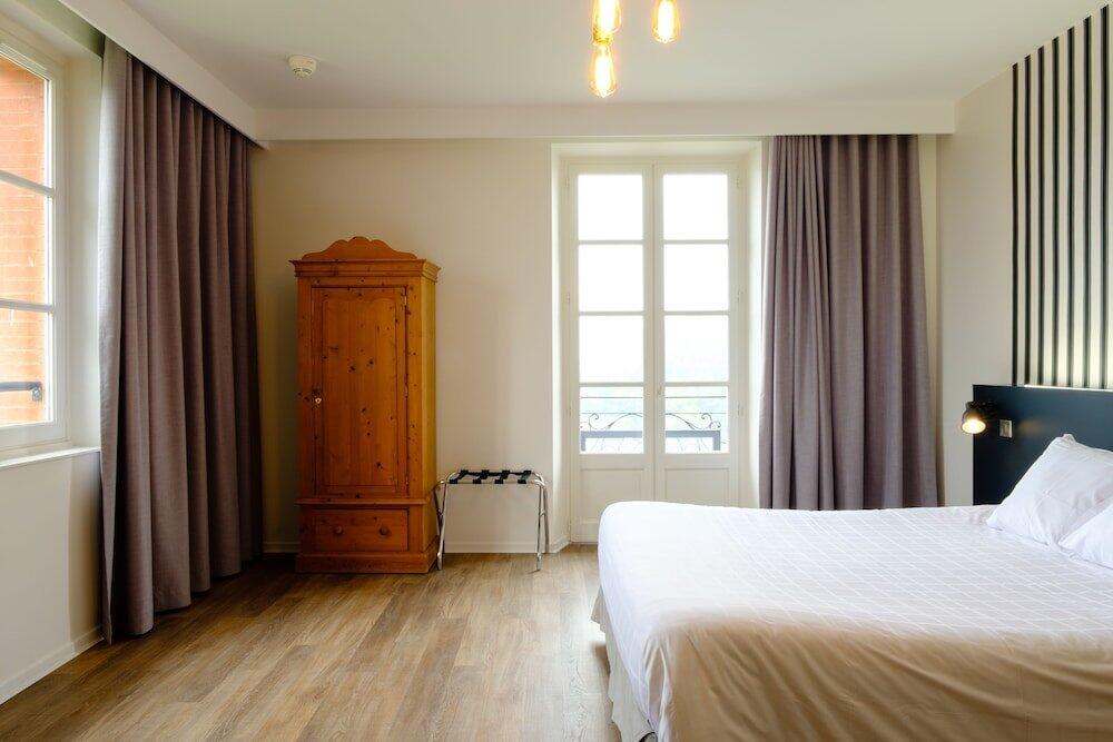 Foto de una habitación de Hôtel &amp;amp; Spa Le Moulin de Moissac