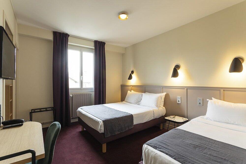 Foto de una habitación de Grand Hotel de la Gare