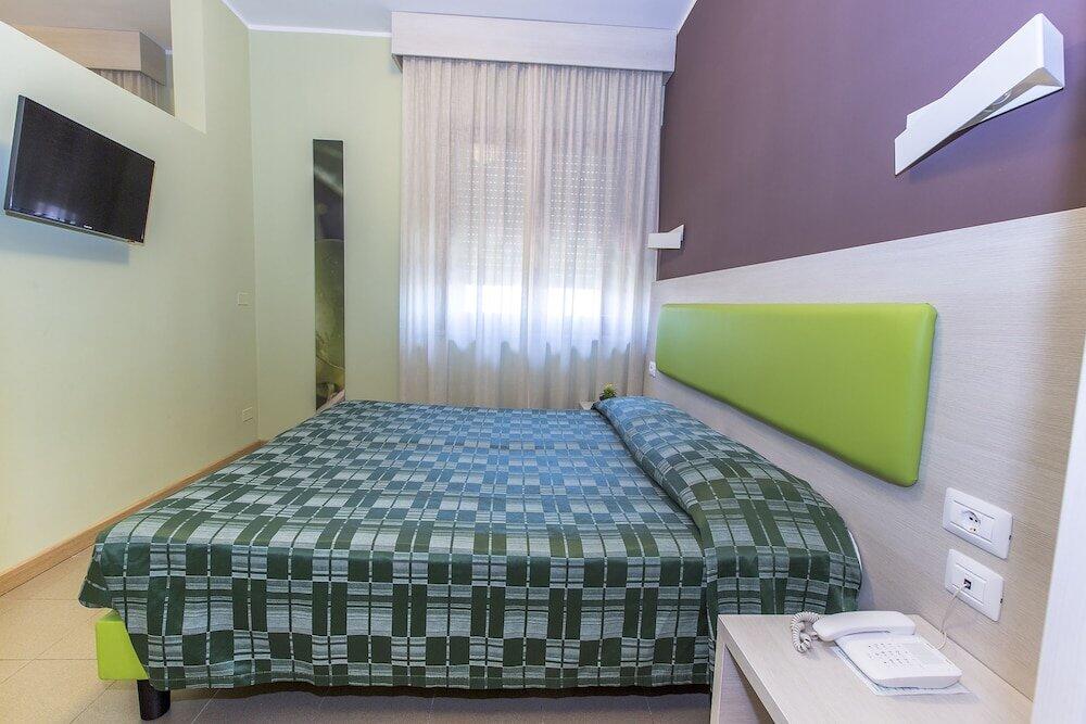 Foto de una habitación de Hotel Residence Ulivi E Palme