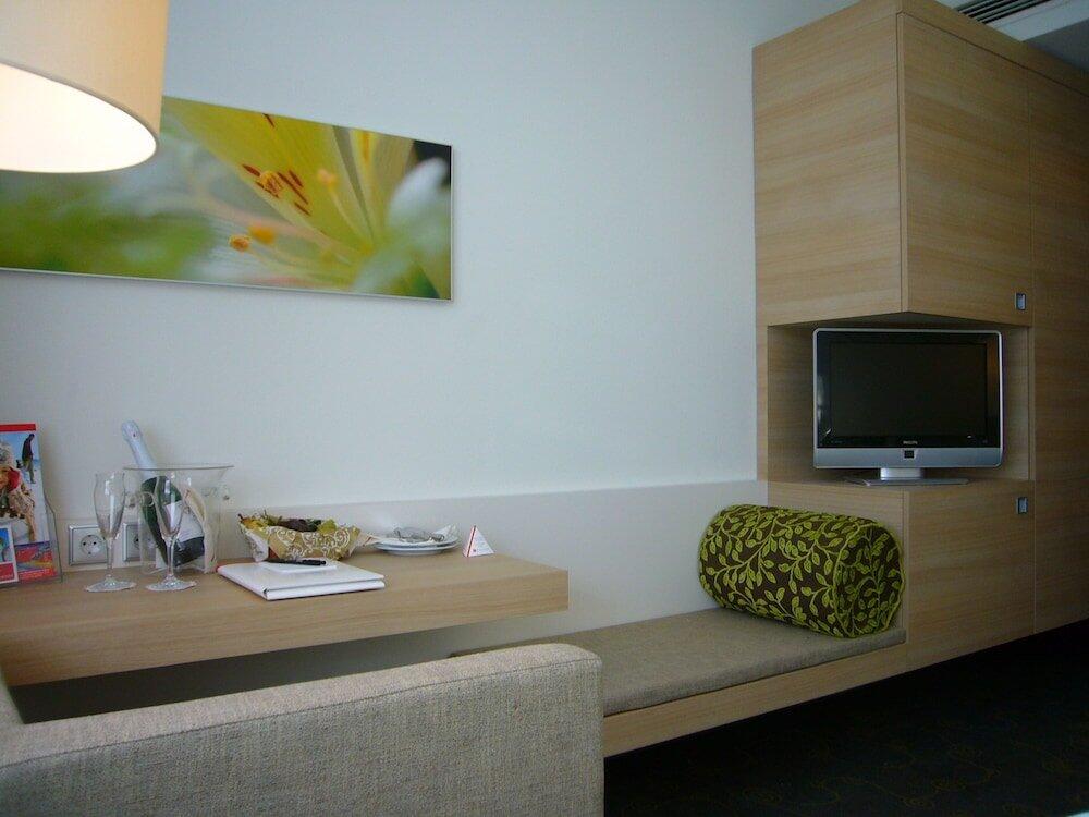 Foto de una habitación de H+ Hotel Salzburg
