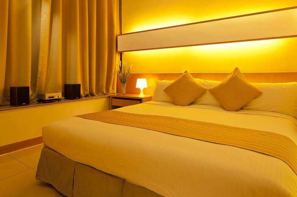 Foto de una habitación de Rambler Garden Hotel