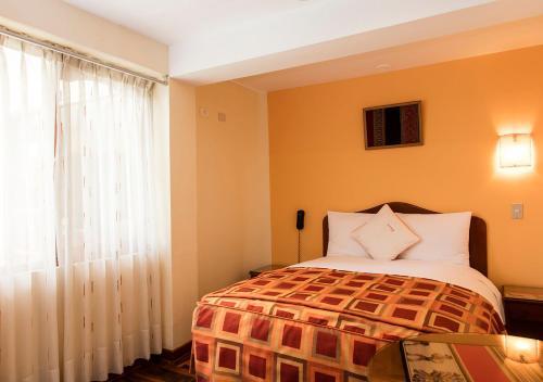 Foto de una habitación de Laramani Hotel Boutique