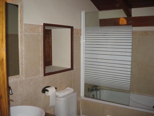 Foto del baño de Hotel La Pradera