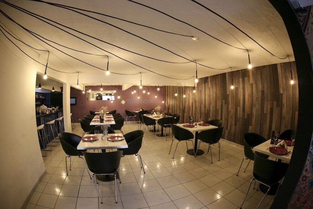 Foto de restauración de Aparthotel Terranova Suites