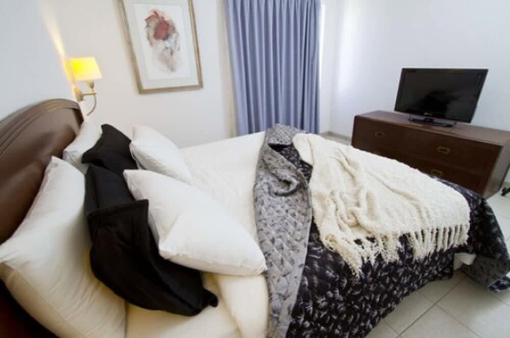 Foto de una habitación de Aparthotel Terranova Suites