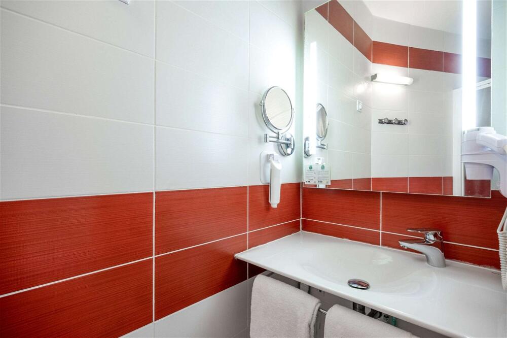 Foto del baño de Comfort Hotel Saintes