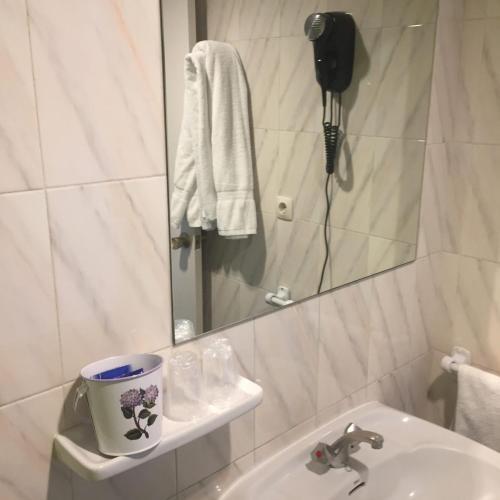 Foto del baño de Hostal Comercio