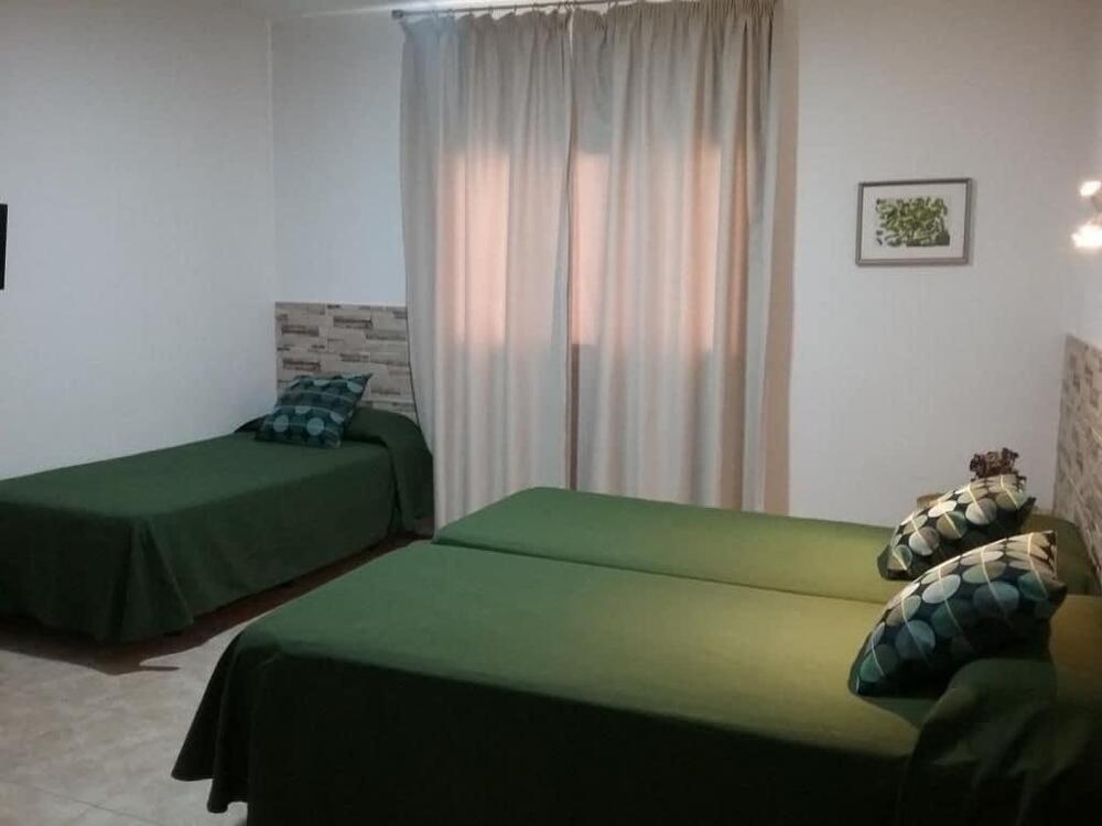 Foto de una habitación de Hostal Residencia Cardona