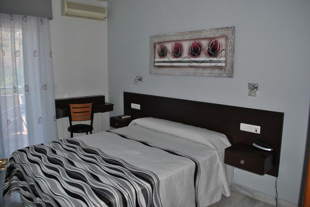 Foto de una habitación de Hotel Albero