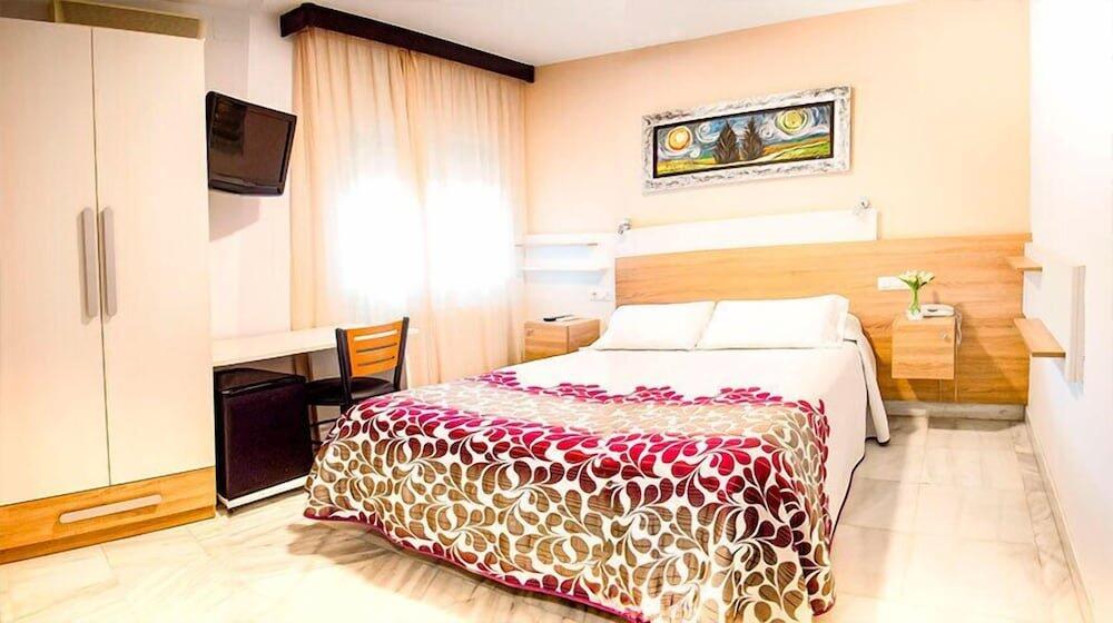 Foto de una habitación de Hotel Albero