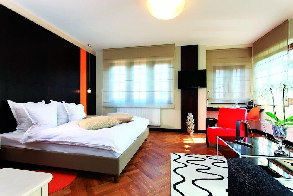 Foto de una habitación de Hotel - Restaurant Le Cerf &amp;amp; Spa