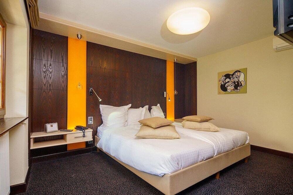 Foto de una habitación de Hotel - Restaurant Le Cerf &amp;amp; Spa