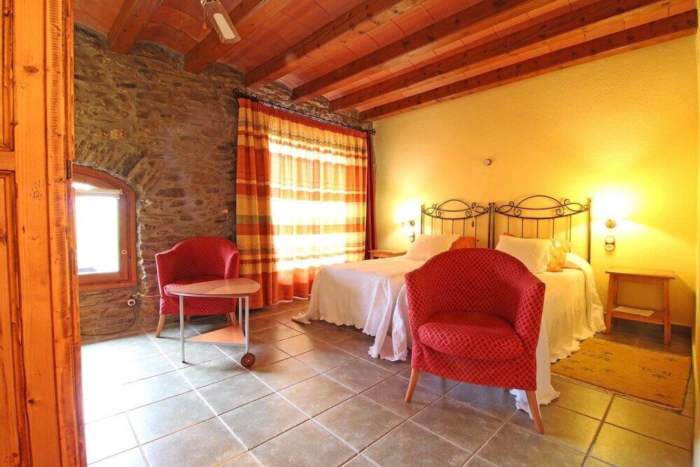 Foto de una habitación de Hotel Mas D&amp;#039;en Roqueta