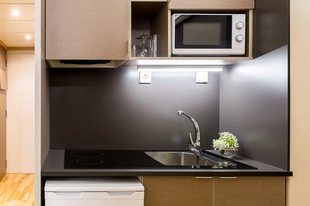 Foto de una habitación de Aparthotel Bonanova Suite