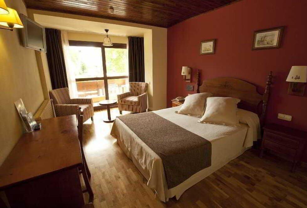 Foto de una habitación de Hotel La Morera