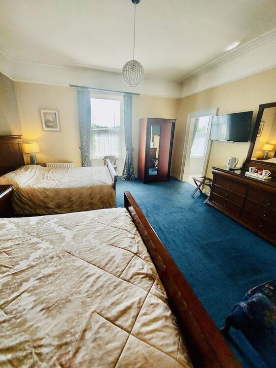 Foto de una habitación de Hostal Belvedere Lodge