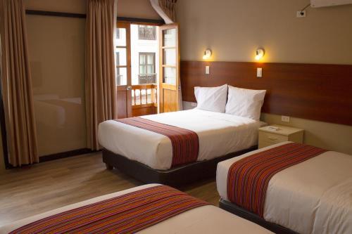 Foto de una habitación de Hotel San Pedro Plaza