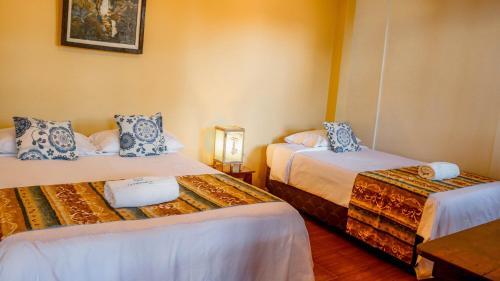 Foto de una habitación de Hotel La Patarashca