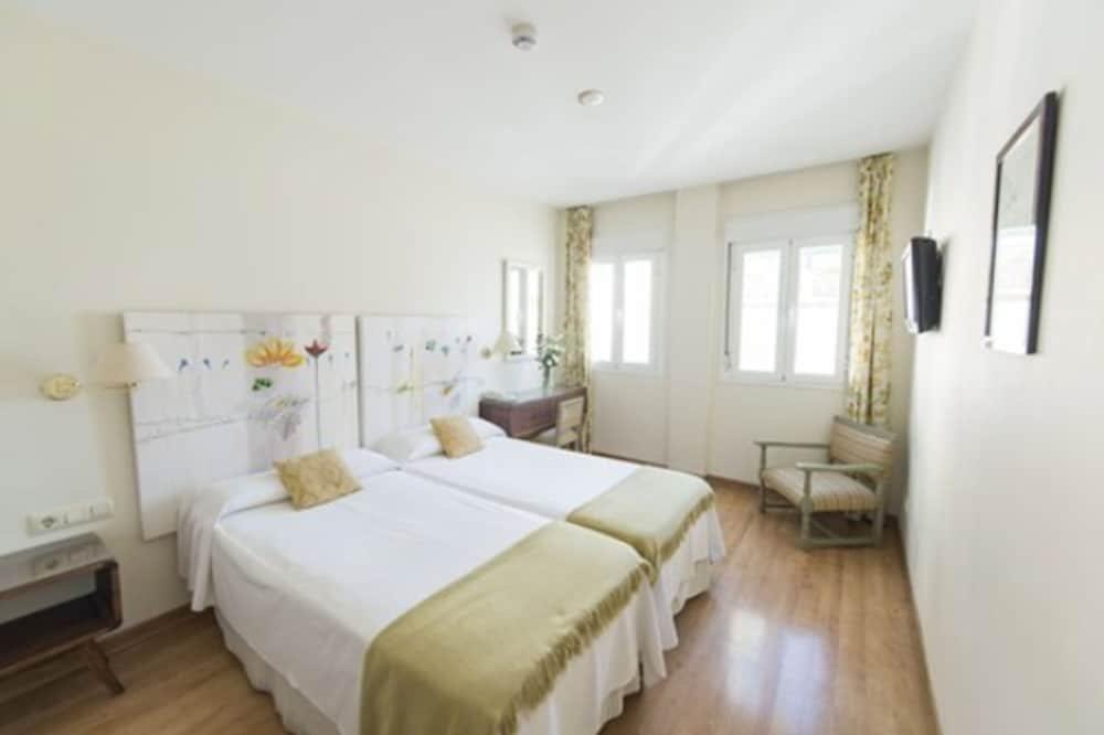 Foto de una habitación de Hotel Alcántara